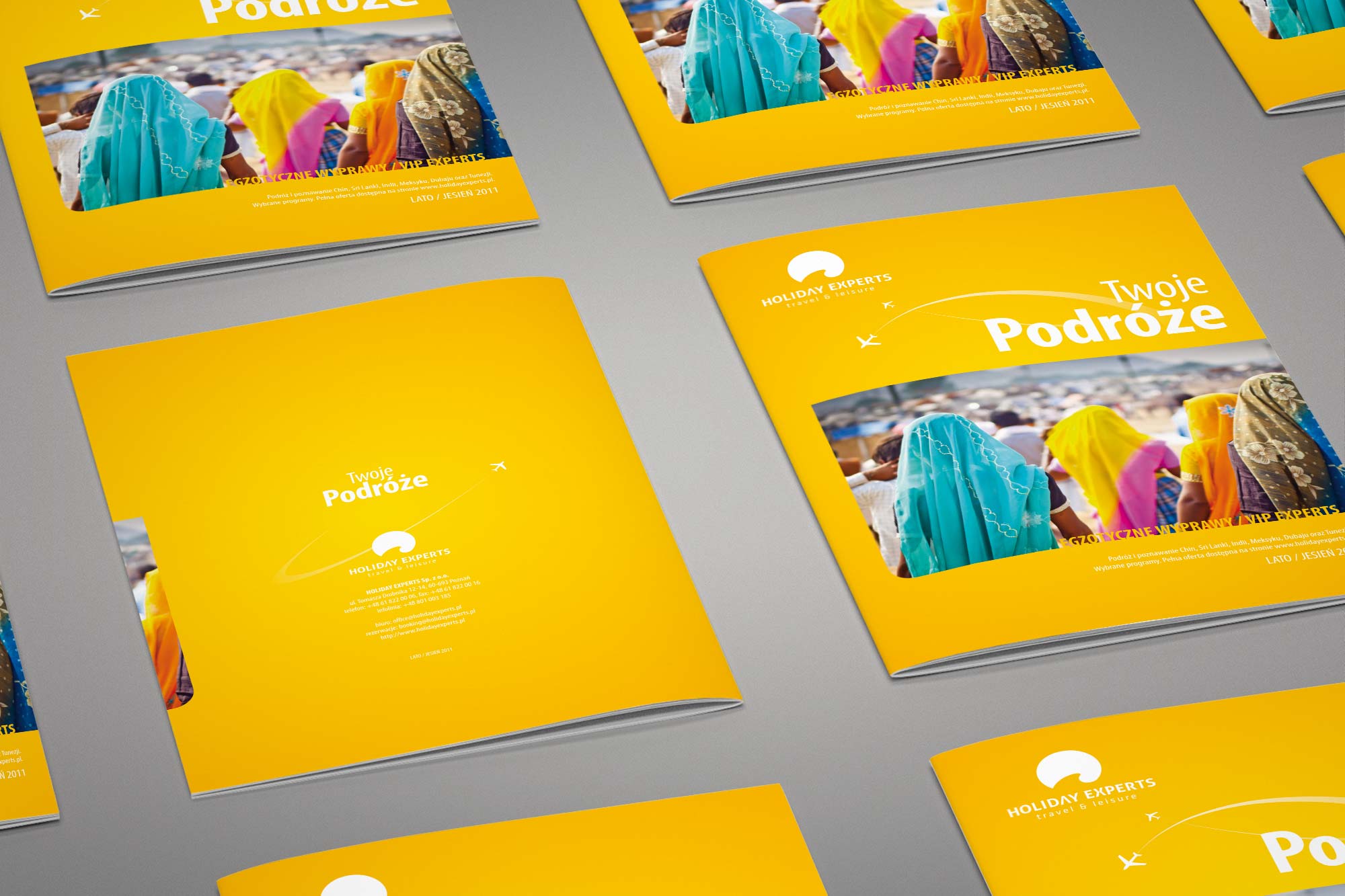 Holiday Experts – multiple copies of the catalogue stacked